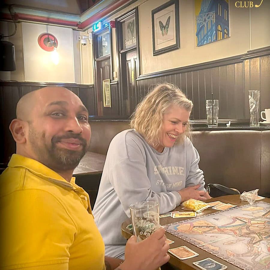 Members playing board games at an Affinity Club games night in Nottingham